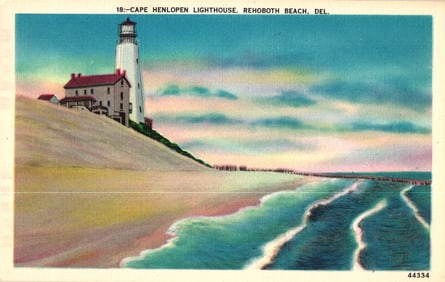 Linen postcard showing the Cape Henlopen Lighthouse on the sandy dunes at Rehoboth Beach, Delaware.