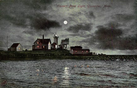 Postcard of Eastern Point Light in Gloucester, Massachusetts. A dramatic nighttime moonlit view.