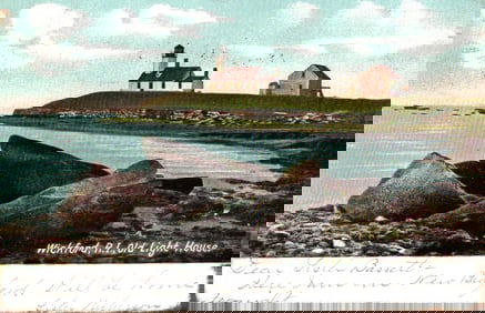 Postcard of the Old Light House in Wickford, Rhode Island, showing a view from the rocky shoreline.