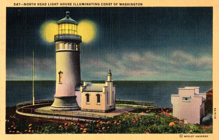 Linen postcard of the North Head Light House illuminating the coast of Washington State at night.