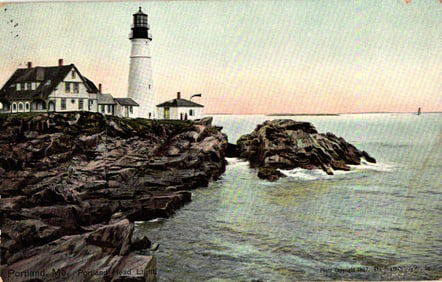 Postcard of Portland Head Light and keeper's house on the rocky coast, Portland, Maine circa 1907.