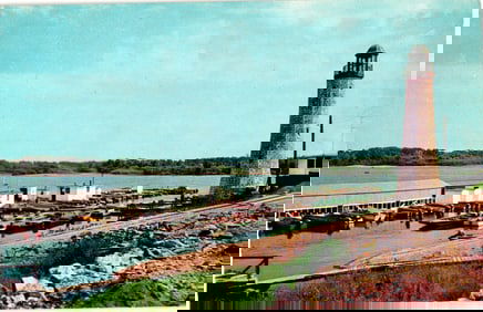 Color postcard showing The Anchorage Boat Harbor on the Mississippi River in Clinton, Iowa c. 1950s