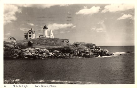 Postcard showing the Nubble Light lighthouse on its rocky island off the coast of York Beach, Maine