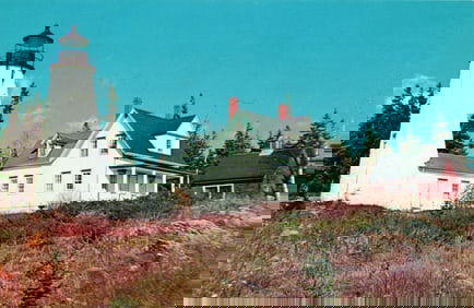 Postcard of Dyce's Head Light and keeper's house on the rocky coast of Castine, Maine, circa 1960s.