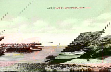 Postcard showing the rocky shoreline and pier at Signal Rock, Woodmont, Connecticut circa 1910s.
