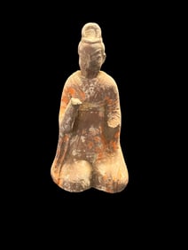 A Small Chinese Painted Pottery Figure of a Kneeling Attendant with Traces of Orange Pigment