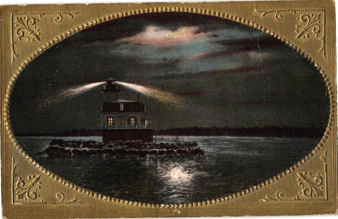 Ornate Vignette Postcard of Lighthouse Emitting Beams of Light Across Water at Night (1 of 2)