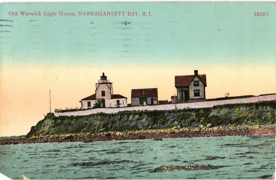 Old Warwick Light House, Narragansett Bay, R. I. early 20th century chromolithograph postcard.: A view of the Old Warwick Light House and its associated structures on a rocky bluff overlooking a body of water. The lighthouse is a white, two-story square tower with a lantern room on top, connecte