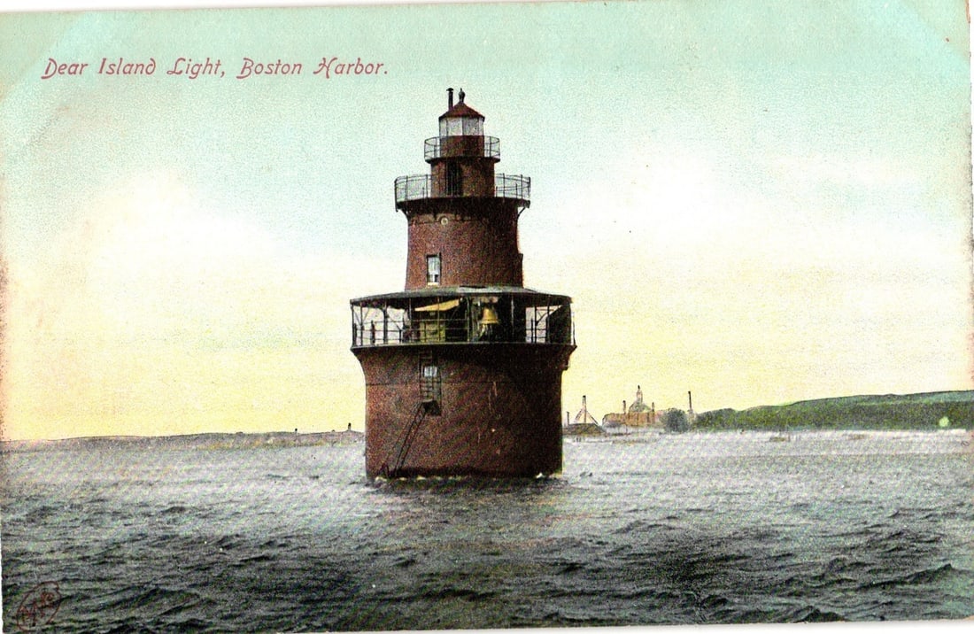 Dear Island Light, Boston Harbor Nautical Structure, Early 1900s American Lighthouse Postcard: A cylindrical red-brick lighthouse stands prominently in open water, featuring a wider lower section with a surrounding platform and railing, topped by a narrower section with a lantern room and conic