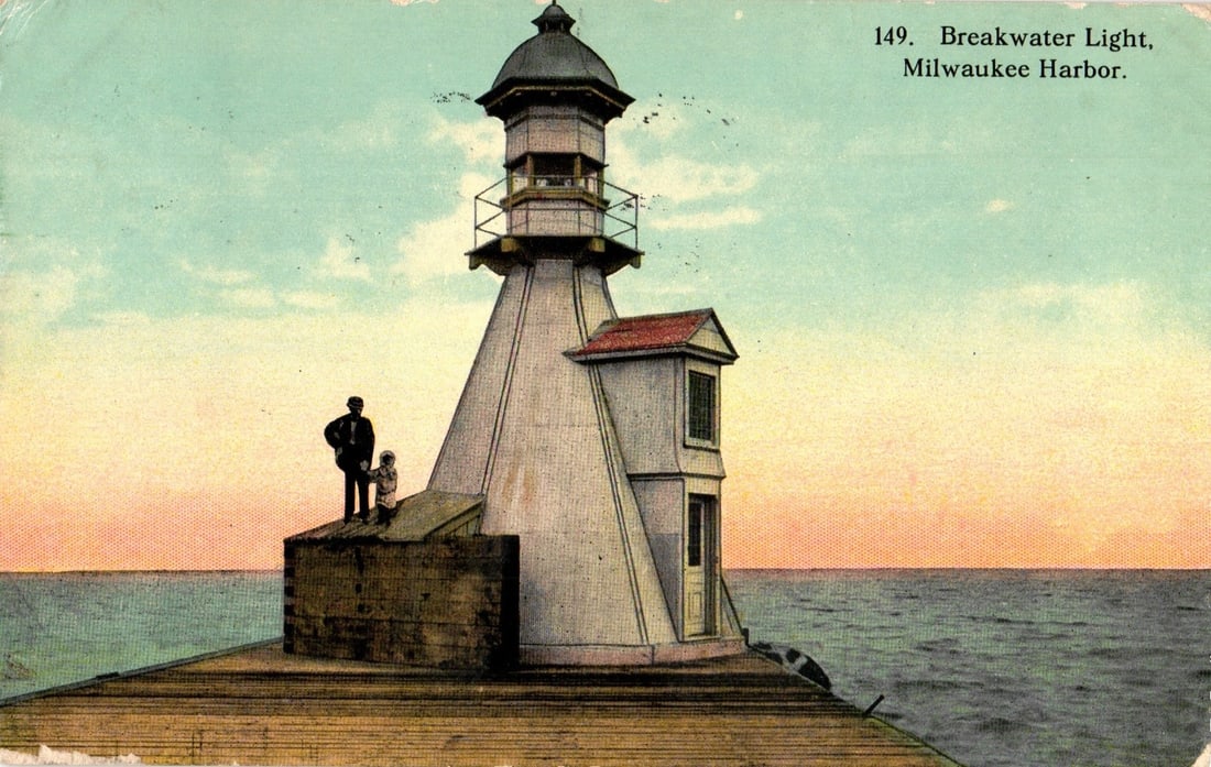 Breakwater Light, Milwaukee Harbor, Wisconsin, with Two Figures, Postmarked 1914 Postcard: A hand-colored photographic print depicts the Breakwater Light in Milwaukee Harbor. The conical lighthouse structure features a hexagonal lantern room surrounded by a railing. A smaller building is at