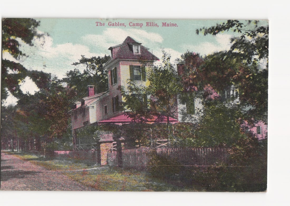 The Gables House, Camp Ellis, Maine, circa 1911 colored architectural view postcard: A large, multi-story residence, "The Gables," is the central subject, featuring a prominent gabled roof with a dormer window. The structure is partially obscured by lush green trees, with a dirt road 