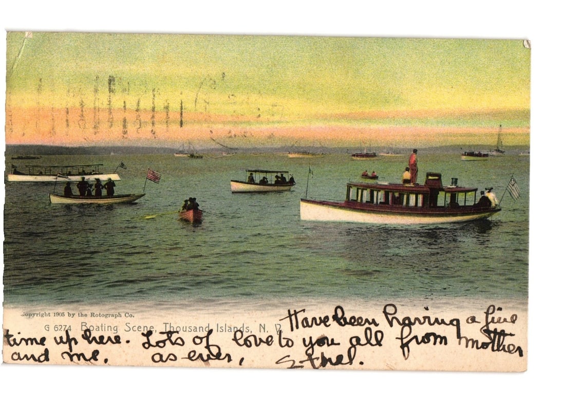 Chromolithograph Postcard of Boating Scene with Passengers, Thousand Islands, New York, 1905: A vibrant chromolithograph depicts a busy boating scene on a wide body of water. In the foreground, a large motorboat carries several passengers, with one individual standing prominently in a red top.