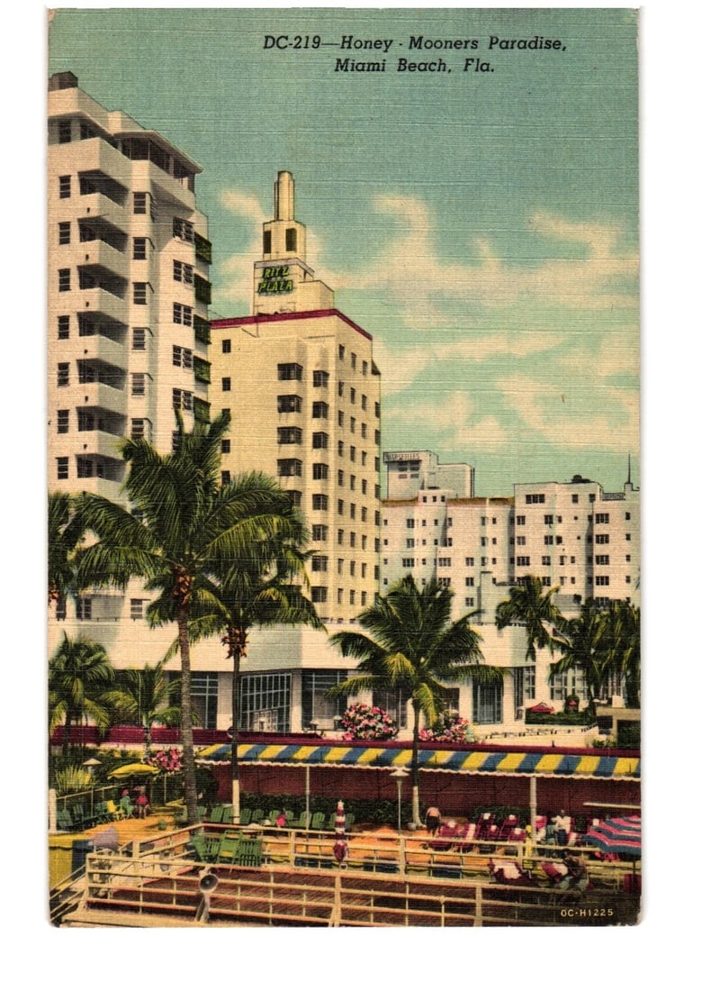 Miami Beach Raleigh Hotel Postcard: Modernist Architecture, Palm Trees, and Pool Area, Circa: A multi-story modernist hotel building with numerous balconies dominates the scene, featuring a central tower-like structure with "THE RALEIGH" visible on its facade. Several tall palm trees are inter