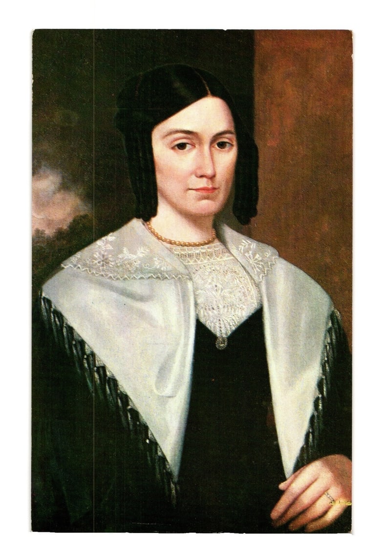 Portrait of Emma Hale Smith (1804-1879) postcard, religious figure, early 19th-century style.: A color photographic reproduction of a painted portrait depicting Emma Hale Smith. She is shown from the waist up, facing forward with a slight turn to the viewer's right. She wears a dark garment, li