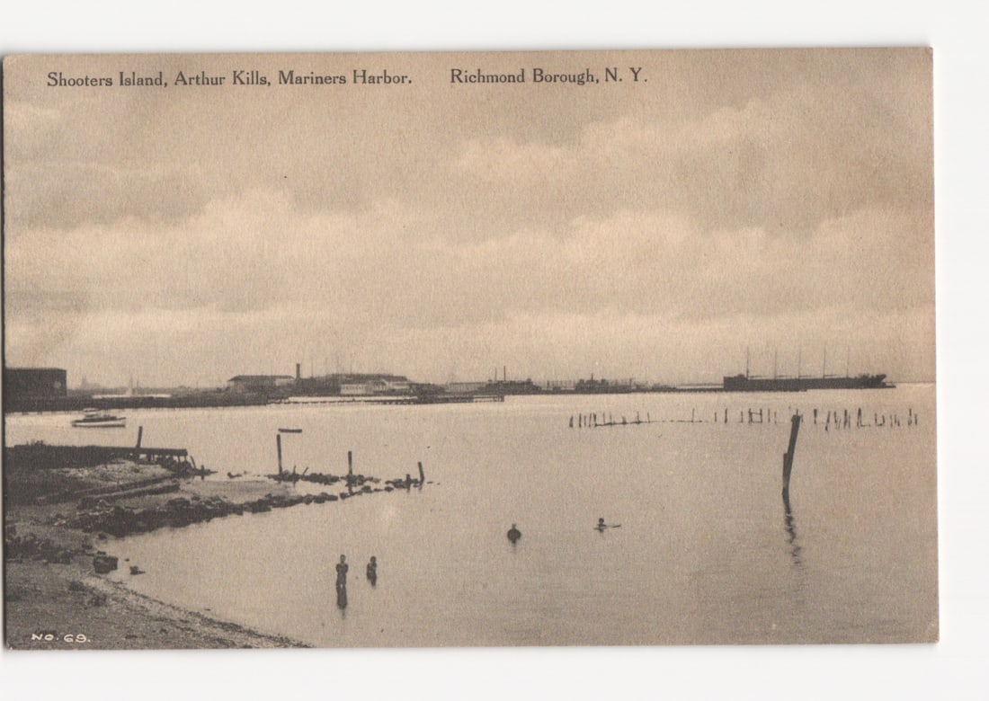 Shooters Island, Arthur Kills, Mariners Harbor Waterway View, Richmond Borough, N. Y. postcard: A sepia-toned photographic print depicts a broad waterway with a distant shoreline under a cloudy sky. The foreground on the left shows a low, muddy bank with some visible debris and wooden structures