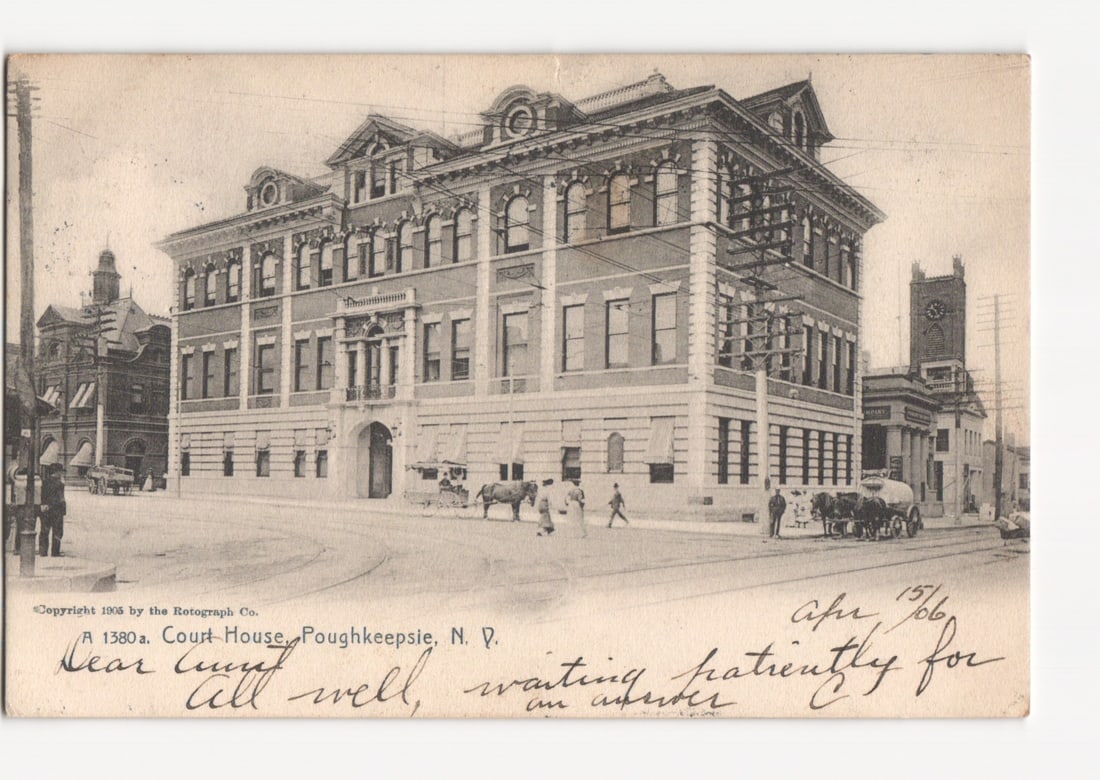 Early 1900s Poughkeepsie, New York Court House Building, a Rotograph Company postcard.: A multi-story Court House building with ornate architectural features, including classical columns, arched windows, and decorative cornices. The building is situated on a curved street with several pe