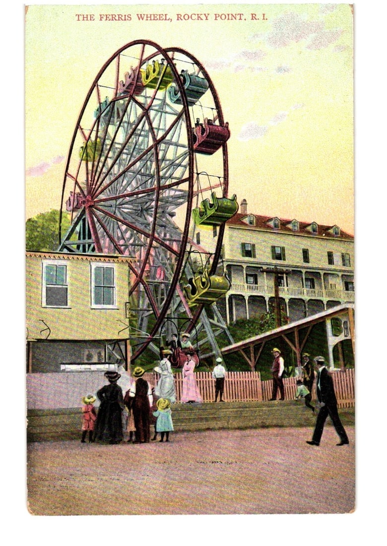 Hand-Colored Ferris Wheel at Rocky Point, Rhode Island, early 20th Century postcard: A large Ferris wheel with red, white, yellow, and green gondolas dominates the left and center of the image. Several gondolas appear occupied. In the foreground, a group of approximately eight figures
