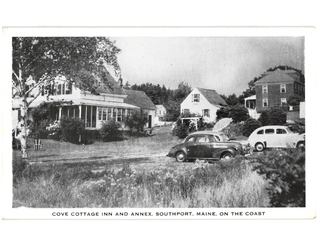 Cove Cottage Inn and Annex, Southport, Maine, 1953 coastal scene vintage photographic postcard: A black and white photographic image depicts the Cove Cottage Inn and Annex in Southport, Maine. The scene features multiple buildings amidst trees and grassy terrain. On the left, a large white multi