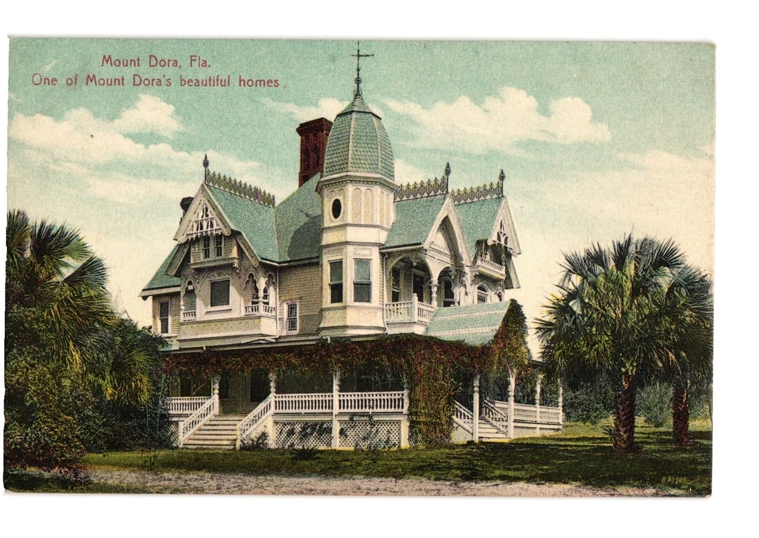 Vintage chromolithograph postcard of an ornate Victorian home with palm trees in Mount Dora, (1 of 2)
