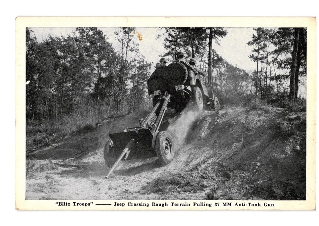 WWII U.S. Army Jeep & Soldiers Pulling 37 MM Anti-Tank Gun on Rough Terrain postcard (1 of 2)