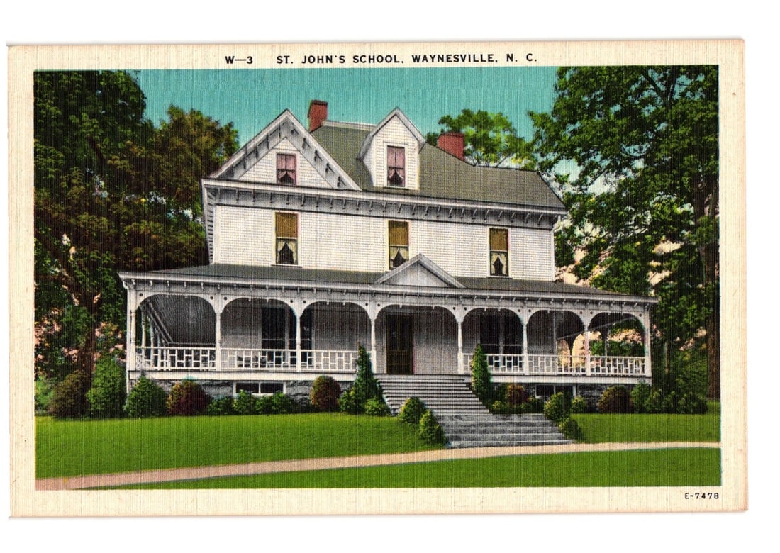 Vintage color lithograph postcard of St. John's School, Waynesville, North Carolina.: A large, two-and-a-half-story white building, identified as St. John's School, Waynesville, N. C., is centrally depicted. The structure features a prominent wraparound porch with multiple columns and 