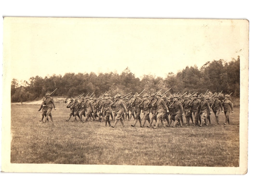 Early 20th Century Military Training Postcard: Soldiers Marching in Formation Across a Field (1 of 2)