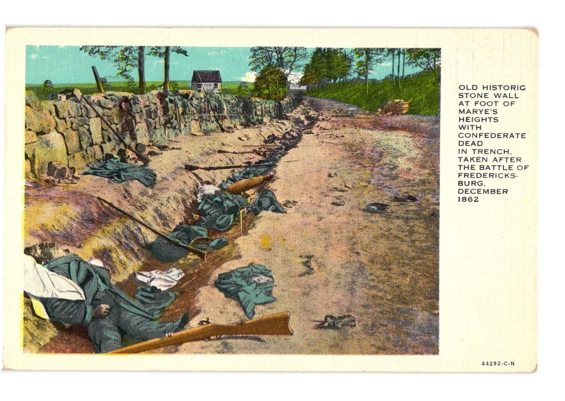 Historic postcard: Confederate dead in trench by Stone Wall, Marye's Heights, Fredericksburg, 1862: A colorized print depicts a historical scene featuring a trench running parallel to a stone wall. Several deceased soldiers in military uniforms, along with rifles and other debris, are visible within