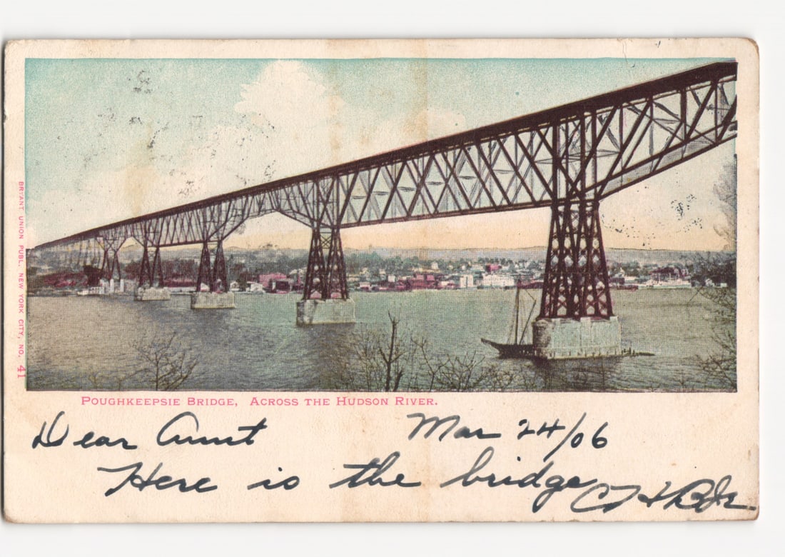 Poughkeepsie Bridge Across Hudson River, New York, Early 1900s Illustrated Postcard: A long-span steel truss bridge, identified as the Poughkeepsie Bridge, dominates the central and upper portion of the image, extending across a wide body of water, the Hudson River. The bridge is supp