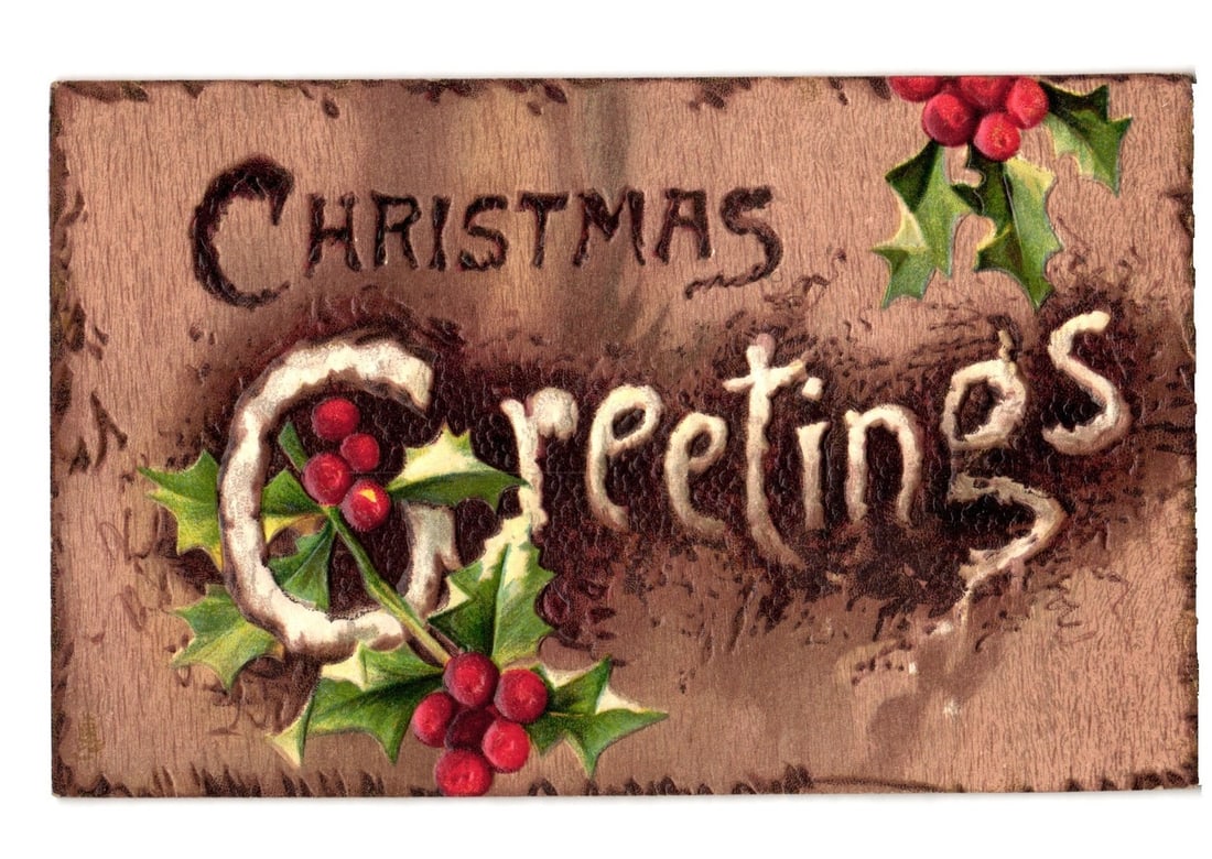 Edwardian Embossed "Christmas Greetings" postcard featuring Holly and Berries, postmarked 1909. (1 of 2)