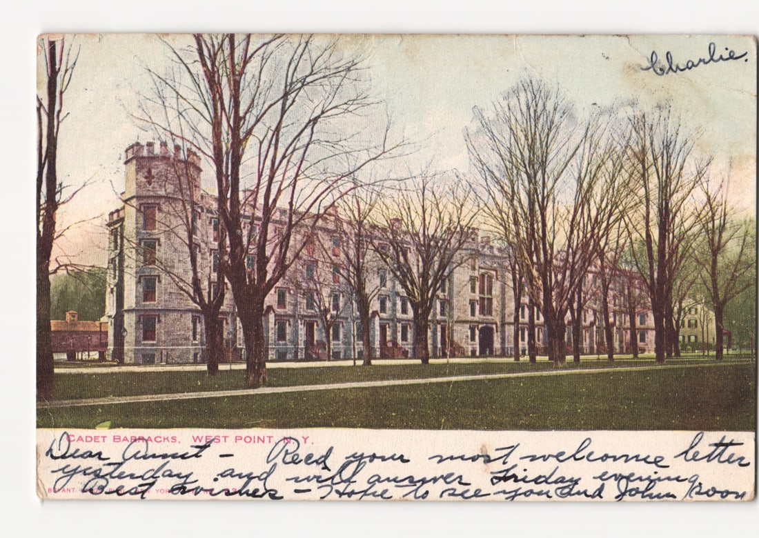 Early 20th Century View of Cadet Barracks at West Point, New York, Scenic Postcard: The postcard features a chromolithographic image of the Cadet Barracks at West Point, New York. The prominent subject is a large, multi-story stone building with a castle-like architectural style, inc