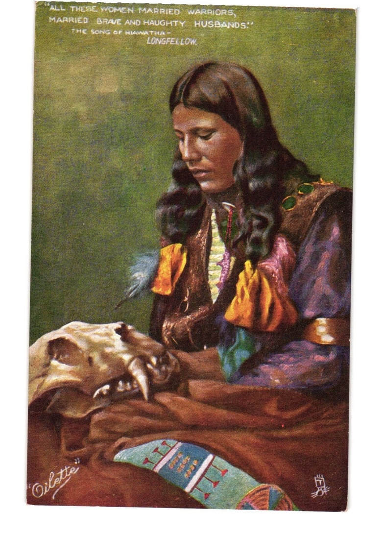 Oilette Postcard: Indigenous Woman with Animal Skull, Featuring Hiawatha Poem by Longfellow.: An Indigenous woman, hair flowing, sits looking downward beside an animal skull with prominent canines. She wears a richly colored garment with yellow and pink accents and a golden belt; a patterned t