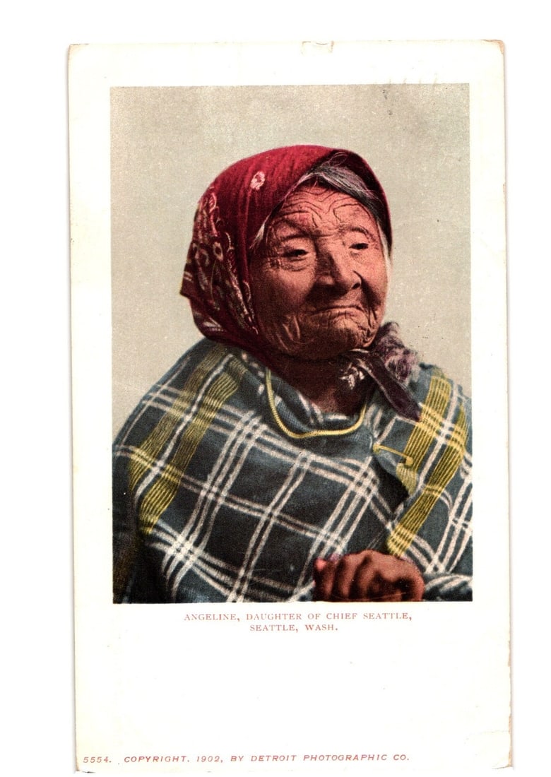 Angeline, Daughter of Chief Seattle, Washington, 1902 Photochrome Portrait Postcard: A head-and-shoulders portrait of an elderly Indigenous woman, identified as Angeline, Daughter of Chief Seattle. She is shown looking slightly right, with a direct gaze. Her face exhibits prominent wr