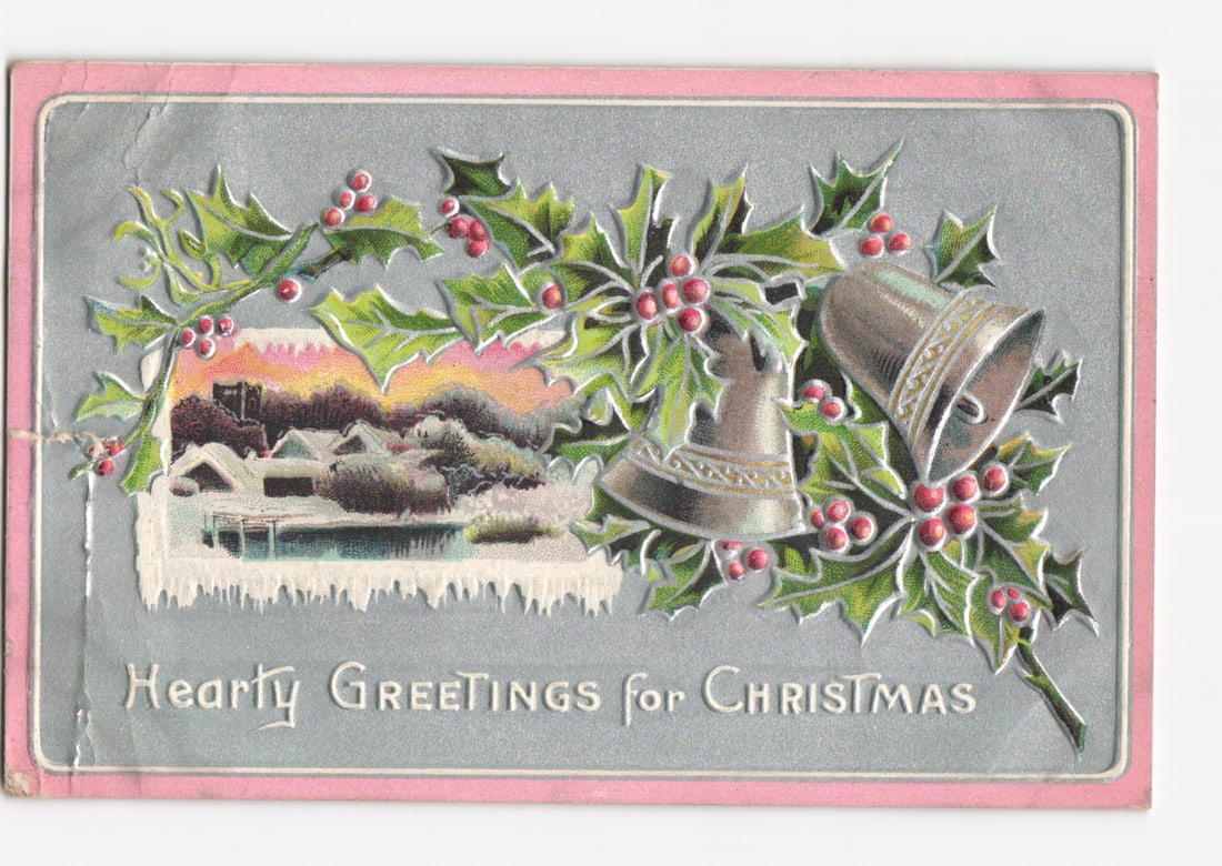 Early 20th-century Christmas postcard with winter scene, holly, and silver bells, 1912. (1 of 2)