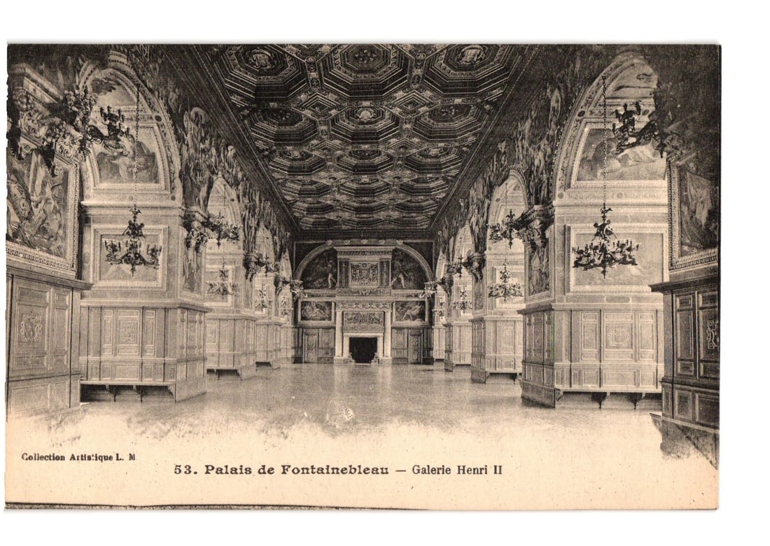 Detailed architectural postcard of the opulent Galerie Henri II within the Palace of Fontainebleau.: The postcard features a detailed black and white photograph, likely a collotype, of the Galerie Henri II within the Palace of Fontainebleau. The image captures a long, symmetrical interior hall. An el