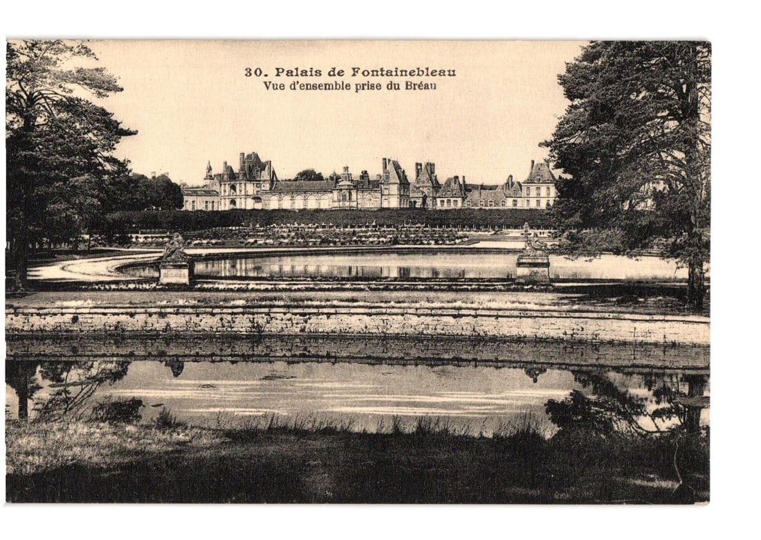 Early 20th Century Palais de Fontainebleau, Overall View from Breau, France Postcard: The Palais de Fontainebleau is depicted in a panoramic, sepia-toned photographic view. The grand palace, featuring multiple wings, turrets, and intricate rooflines, stands prominently in the middle gr