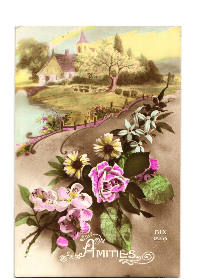 Early 20th Century Chromolithograph postcard of a picturesque cottage, river, and floral bouquet.: A picturesque landscape scene is depicted, featuring a thatched-roof cottage with a prominent church steeple in the background. A bridge arches over a serene river in the midground, with lush trees an