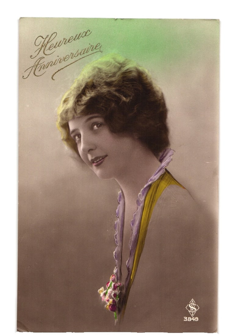 Early 20th C. French "Heureux Anniversaire" portrait postcard of a stylish young woman. (1 of 2)