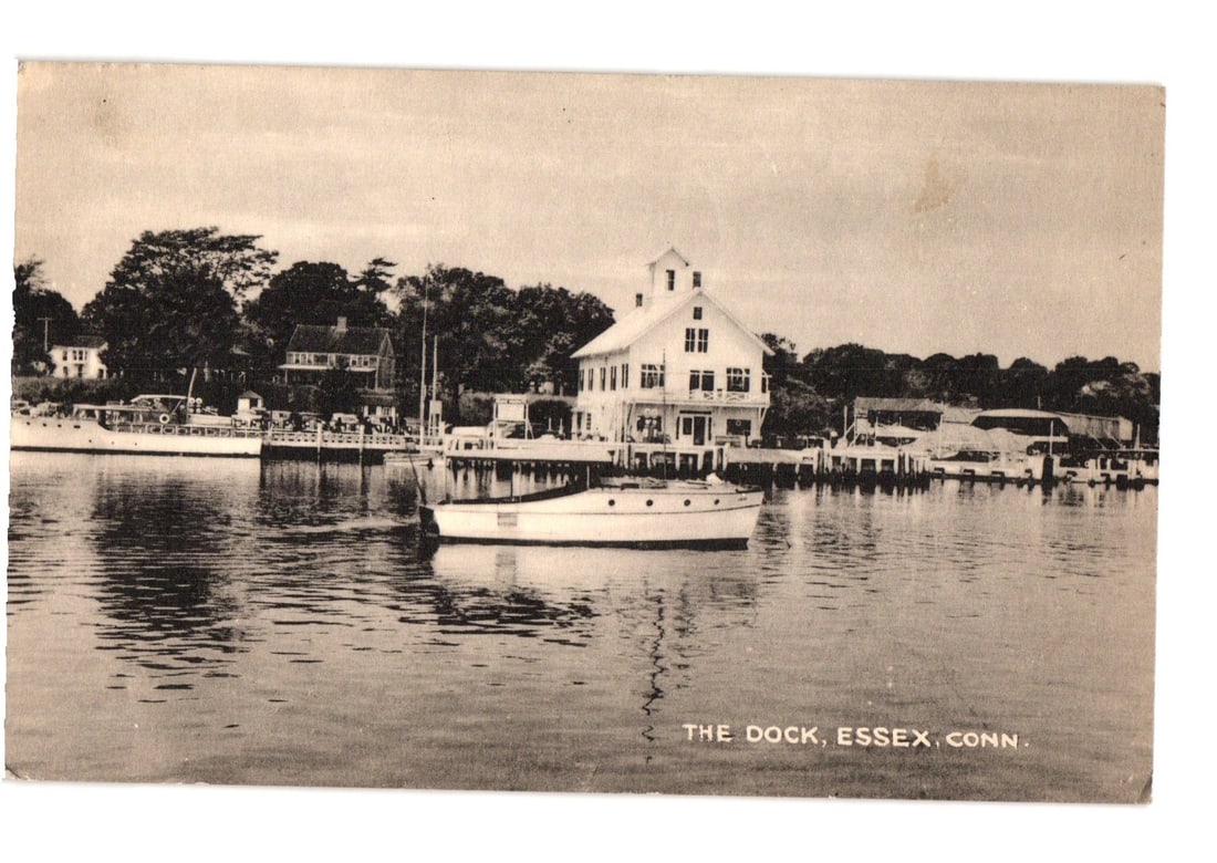 1949 postcard depicting The Dock in Essex, Connecticut, featuring boats and waterfront structures. (1 of 2)