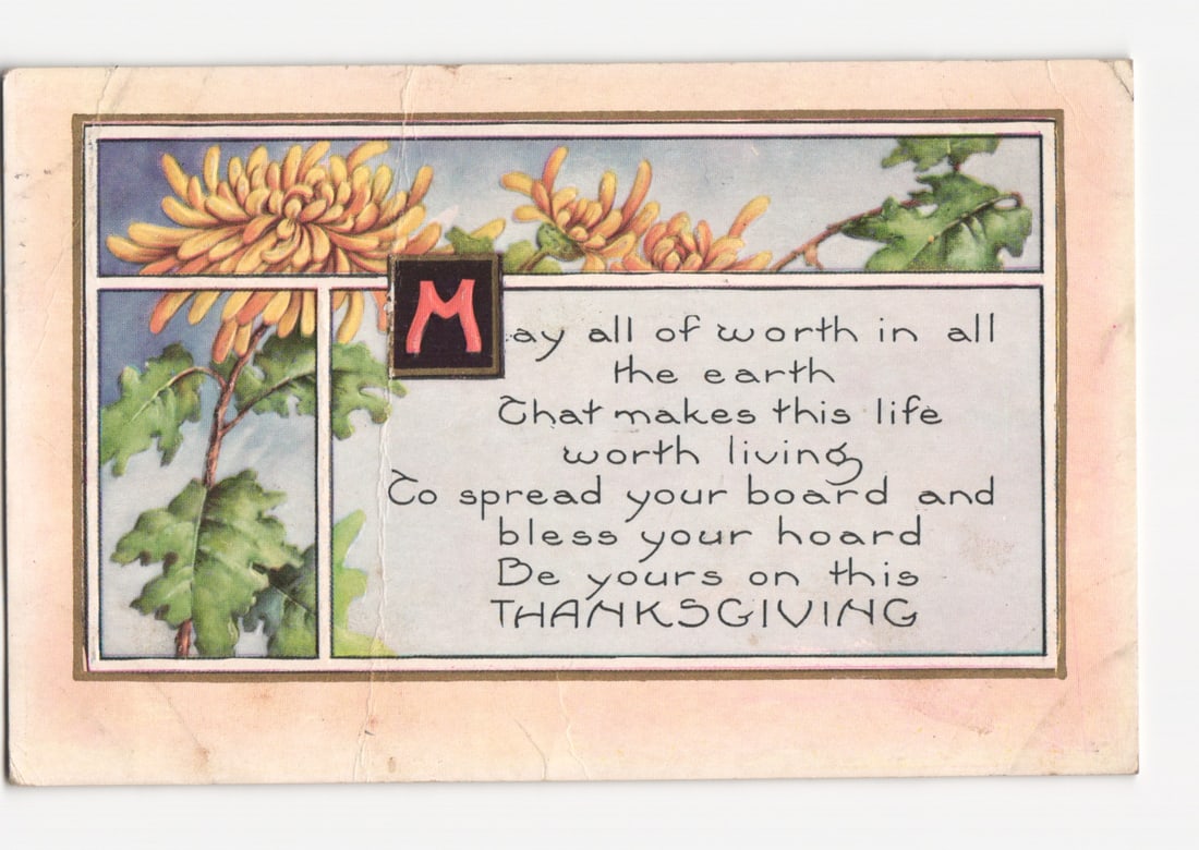 Thanksgiving postcard with Chrysanthemums and Oak, Postmarked New York, NY, November 1909.: A chromolithograph postcard featuring yellow-orange chrysanthemums and green oak leaves. These floral and foliage elements frame a central text panel on the right. The panel begins with a large red in