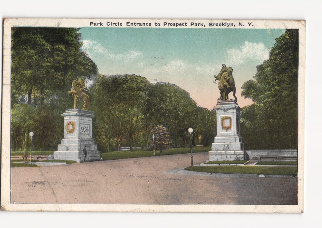 Early 20th Century Postcard depicting Equestrian Statues at Prospect Park, Brooklyn, N. Y.: The front of the postcard features a colorized street scene depicting the Park Circle Entrance to Prospect Park in Brooklyn, New York. Two large equestrian statues, rendered in a bronze hue, stand ato