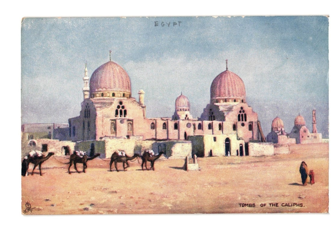 Early 20th Century Lithograph Postcard: Tombs of the Caliphs with Camels in a Desert Landscape,: A color lithograph postcard depicts the Tombs of the Caliphs in Egypt. The scene features a complex of domed, light-colored stone buildings under a pale blue sky, set against a sandy desert foreground