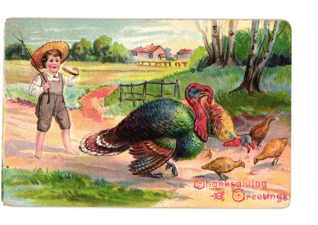 Thanksgiving Greetings postcard featuring a boy, turkeys, and fowl in a rural setting, early 20th: A chromolithograph postcard depicts a young boy in a straw hat and overalls, holding a stick and a piece of food. He stands barefoot on a dirt path next to a male turkey displaying its colorful plumag