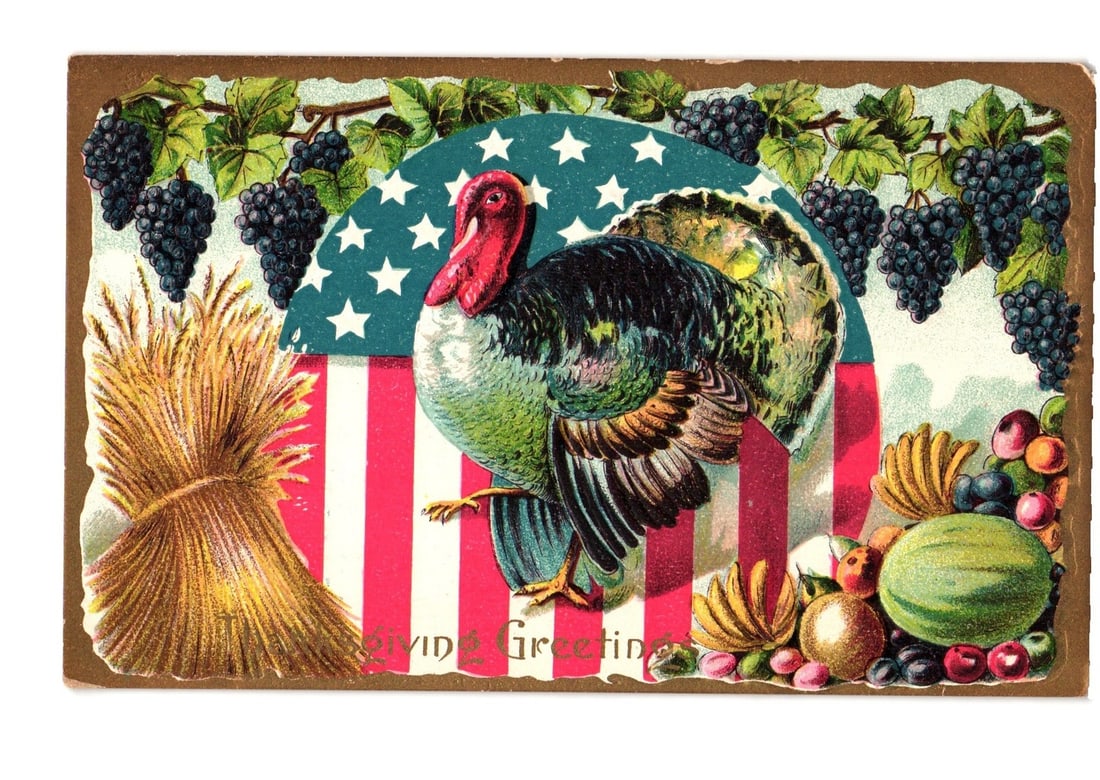 Vibrant chromolithograph Thanksgiving postcard featuring turkey, American flag, wheat, and fruits.: A brightly colored chromolithograph depicts a large turkey positioned centrally against a stylized American flag background, with a blue field and white stars, and red and white stripes. To the left i