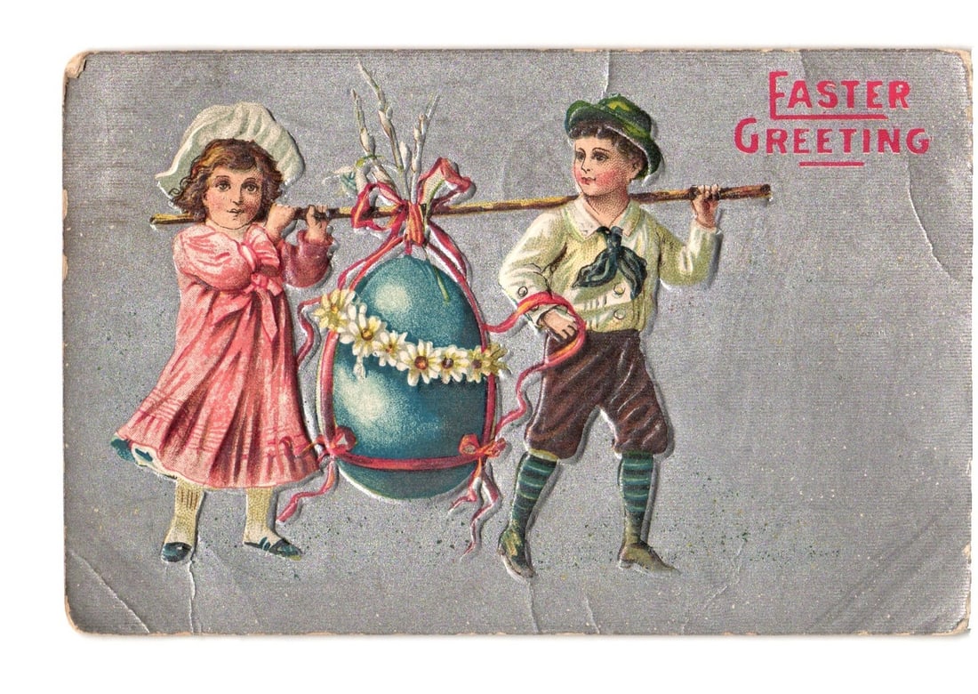 Antique Easter Greeting Postcard: Two Children Carrying a Large Decorated Easter Egg, 1908: A boy and a girl carry a large, elaborately decorated blue Easter egg on a pole over their shoulders. The girl, on the left, wears a white bonnet and a pink dress. The boy, on the right, wears a green