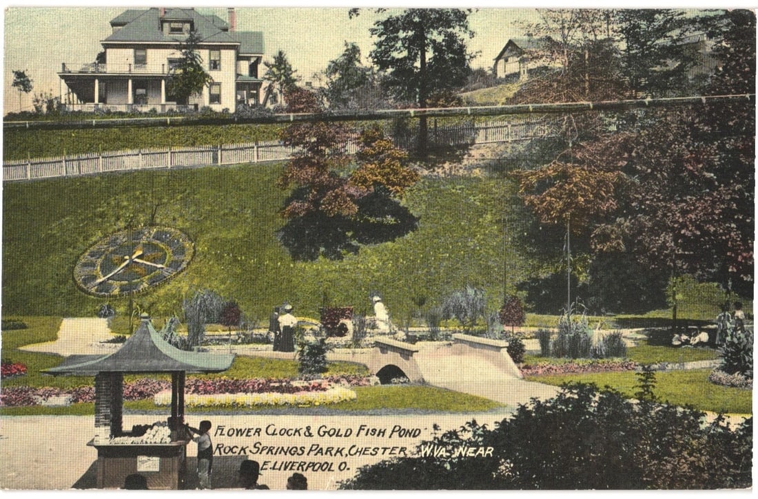 Rock Springs Park Flower Clock and Gold Fish Pond, Chester, W. Va. Vintage Postcard: A colorized photographic postcard depicts a detailed view of Rock Springs Park. The foreground features a landscaped area with a large floral clock, its hands clearly visible, set into a grassy hillsi