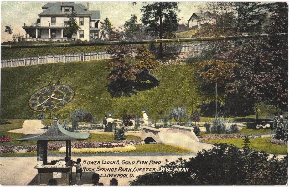 Flower Clock & Gold Fish Pond, Rock Springs Park, Chester, West Virginia, early 20th century: A landscape view of Rock Springs Park in Chester, West Virginia, near East Liverpool, Ohio. The scene features a prominent flower clock and a gold fish pond in the foreground. A decorative arched brid