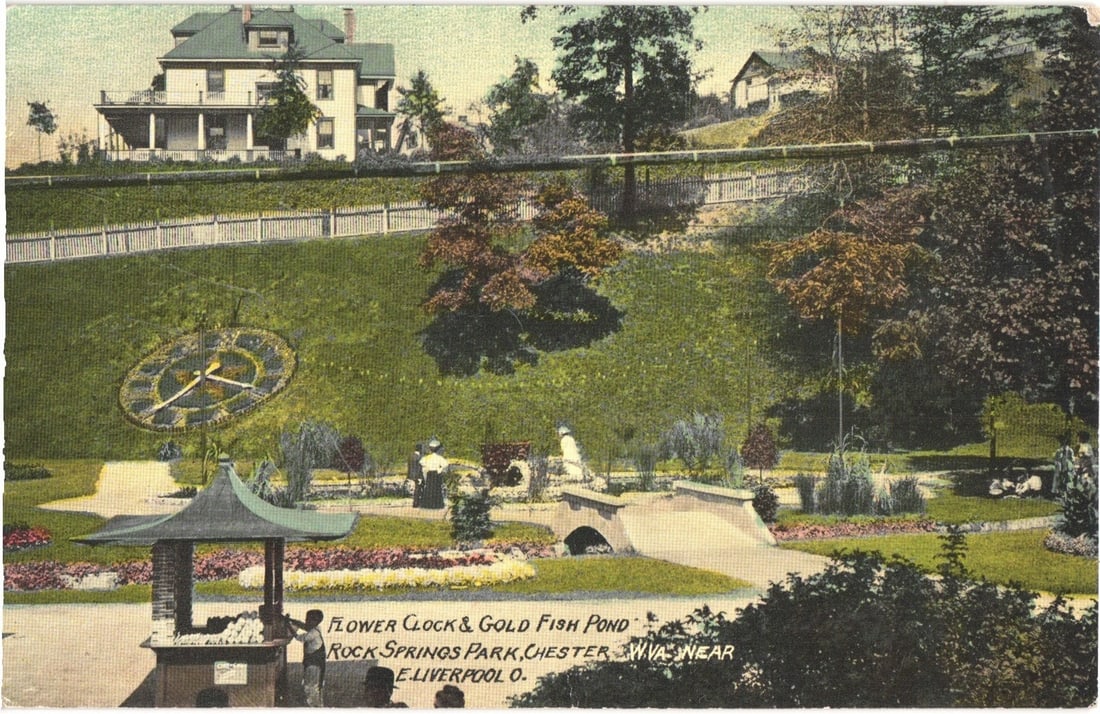 Vibrant Chromolithograph Postcard of Flower Clock and Gold Fish Pond, Chester, WV Park Scene: The scene depicts a picturesque park, dominated by a large flower clock on a verdant hillside. The clock face features distinct hands and numerals formed by plantings. In the foreground, a tranquil go