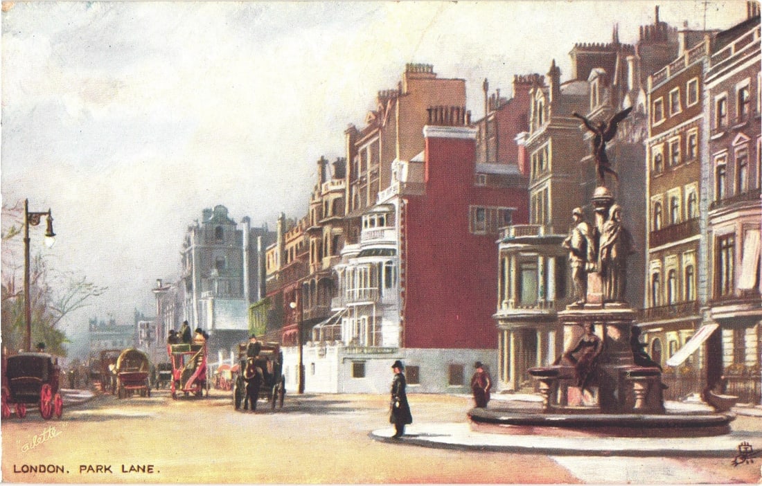 London Park Lane Street Scene with Horse-Drawn Carriages and a Monument, Early 1900s Postcard: A vibrant chromolithograph depicts a street scene along Park Lane in London. The foreground features a wide intersection with horse-drawn carriages and several pedestrians. To the right, a prominent f