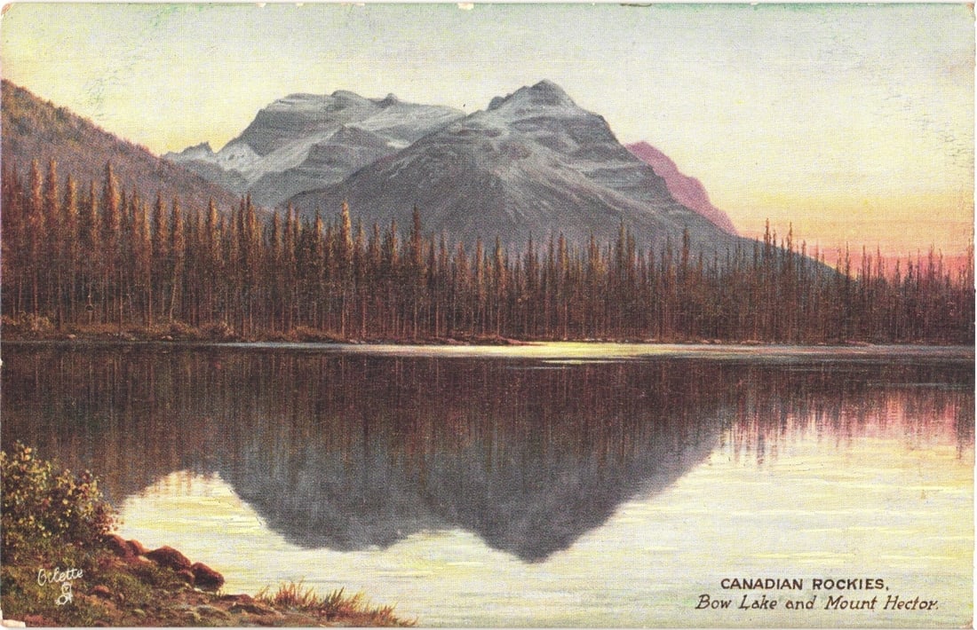 Mountain Landscape Postcard: Bow Lake and Mount Hector in the Canadian Rockies: Chromolithograph of Bow Lake and Mount Hector in the Canadian Rockies. The scene depicts a tranquil lake reflecting coniferous trees and snow-capped mountains under a warm sky, suggesting dawn or dusk