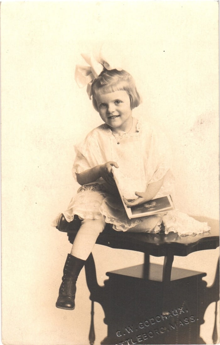 Portrait of a Young Girl in White Dress with Bow Holding a Book, Attleboro, Mass. Real Photo (1 of 2)